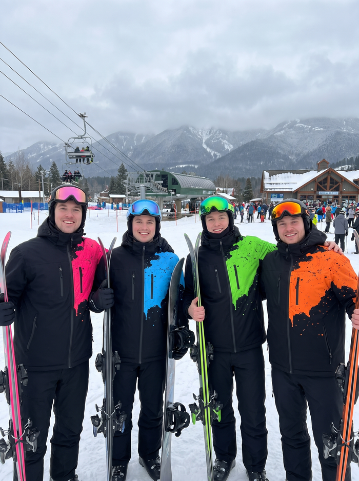 Four friends at the chairlift in four StormShift colorways